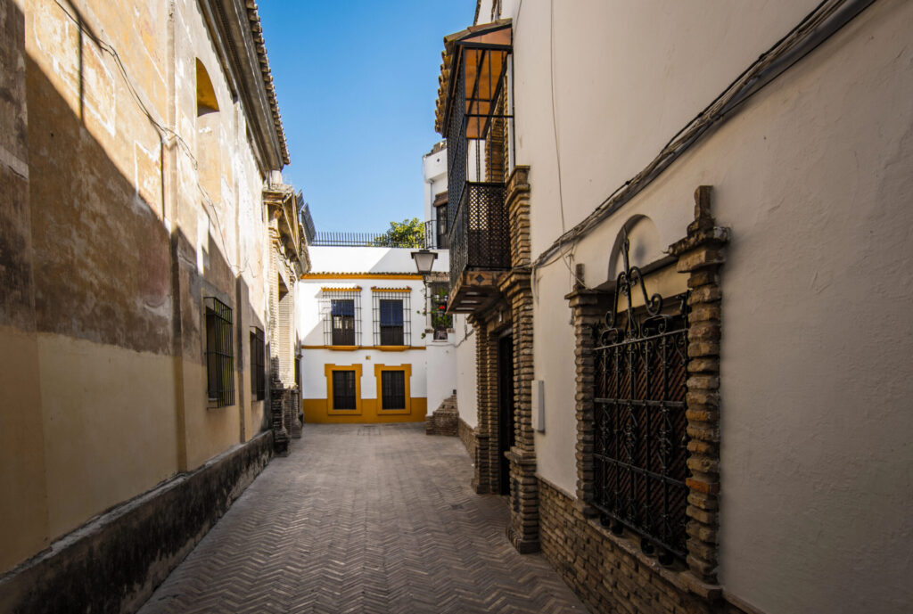Narrow streets of the Santa Cruz neighborhood, Seville, Andalusia, Spain