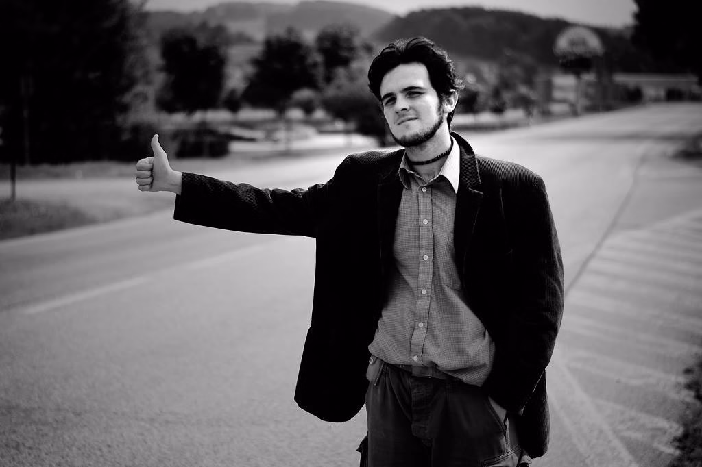 A charming hitchhiker, Matouš's partner Honza Mrázek