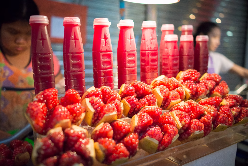Fresh pomegranate juice and fruit in Thailand.