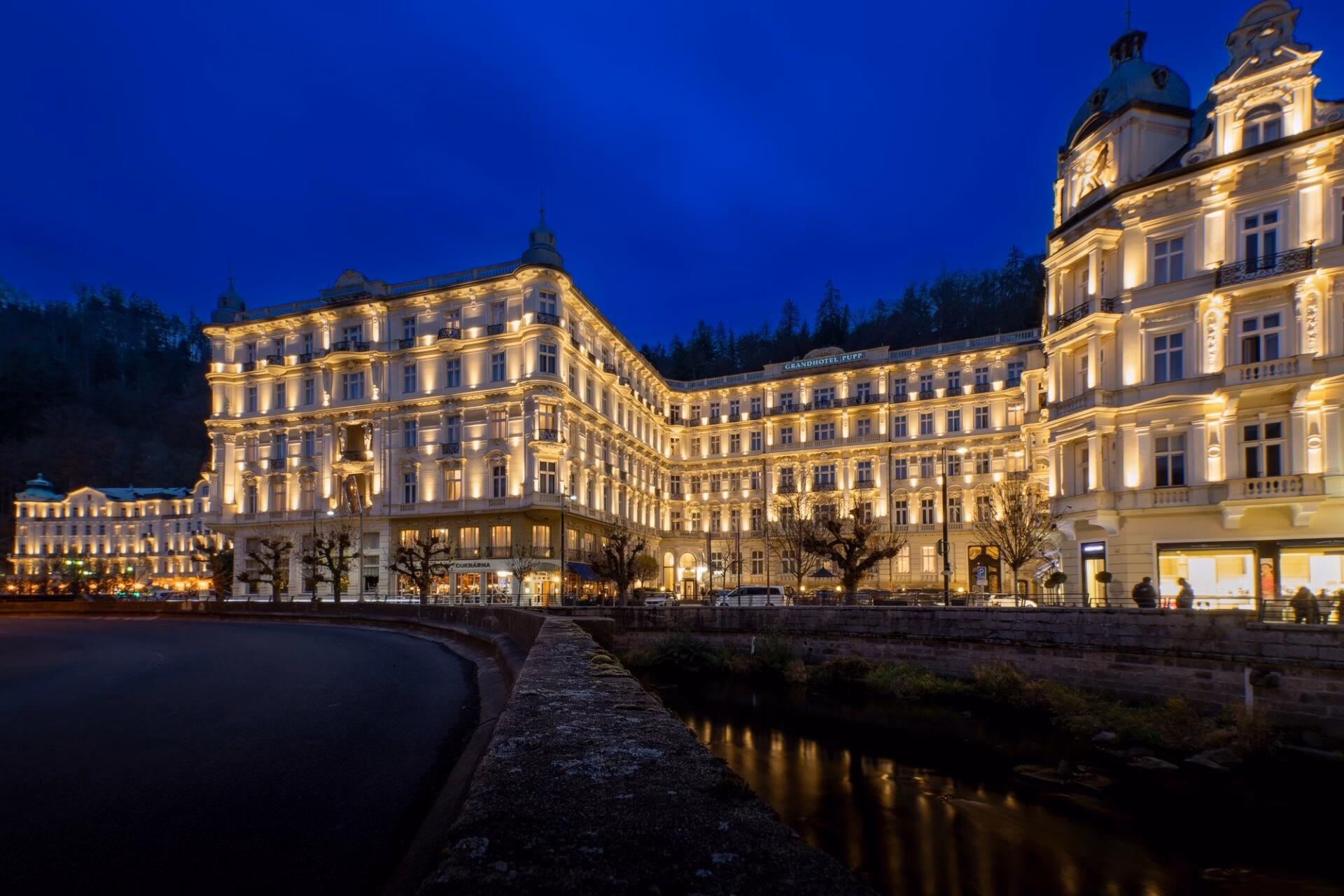 Grandhotel Pupp in Karlovy Vary at night with its illuminated neo-Baroque facade