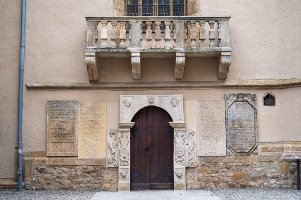 Gothic portal with tympanum on the southern façade of the Basilica of Saints Erasmus and Pancras in Jelenia Góra