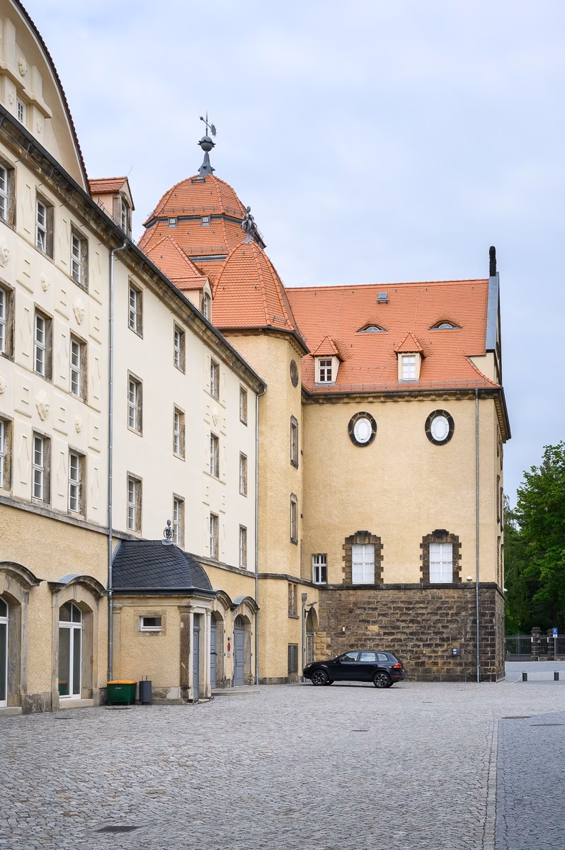 Street view of Sonnenstein Castle above Pirna's historic centre