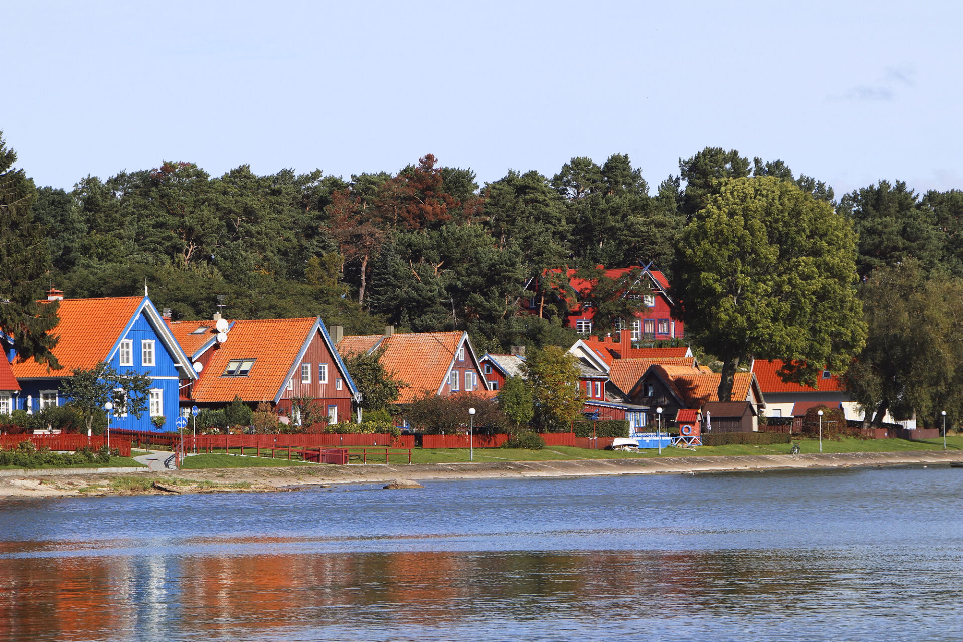 Colourful wooden fishermen's houses in Nida on the shore of the Curonian Lagoon