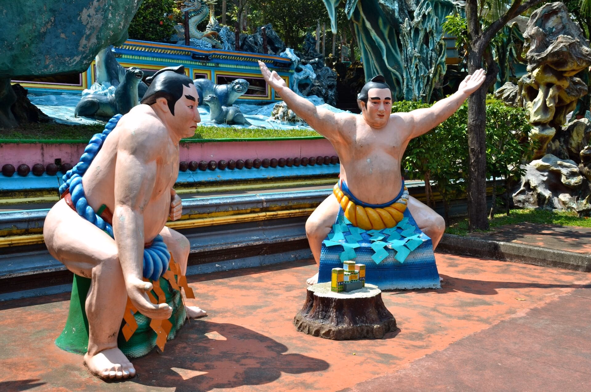 Sumo wrestler statues at Singapore's Haw Par Villa park