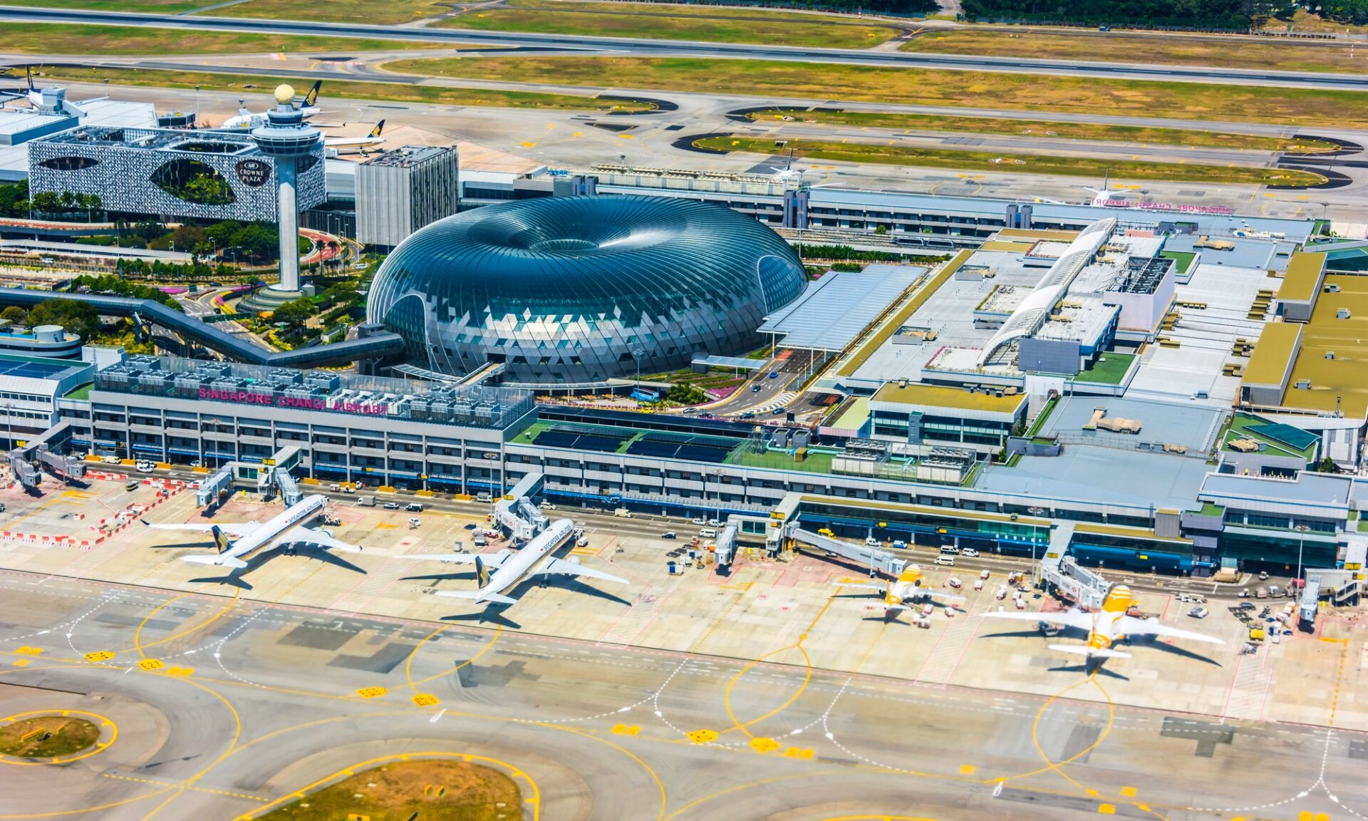 Aerial view of Changi Airport with the glass dome of Jewel