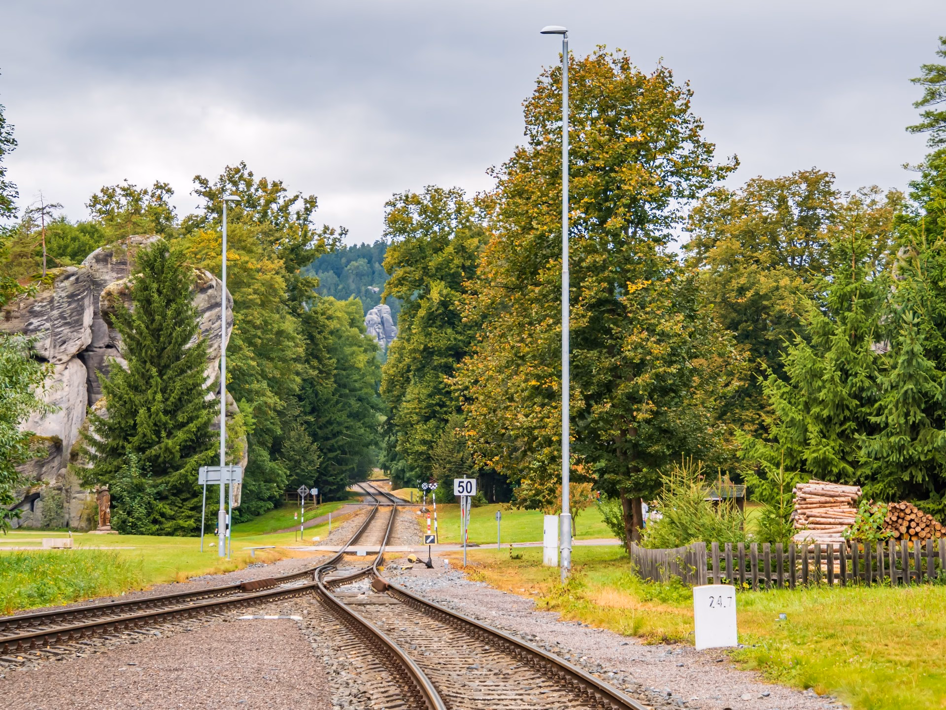 Railway track and switch at the Adršpach stop among sandstone rocks