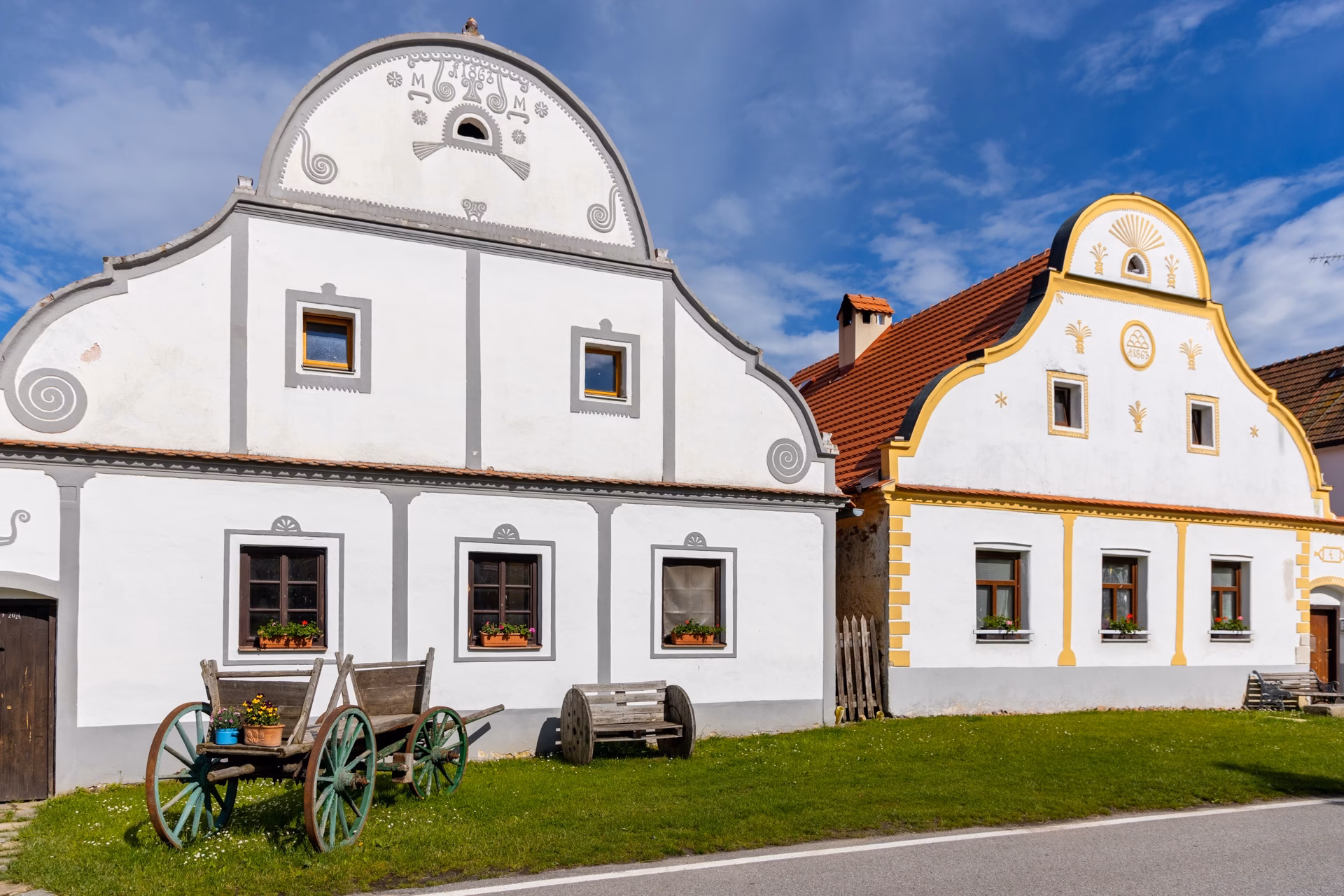 Holašovice farmstead gables with stucco decoration, the date 1863 and a farmer's initials