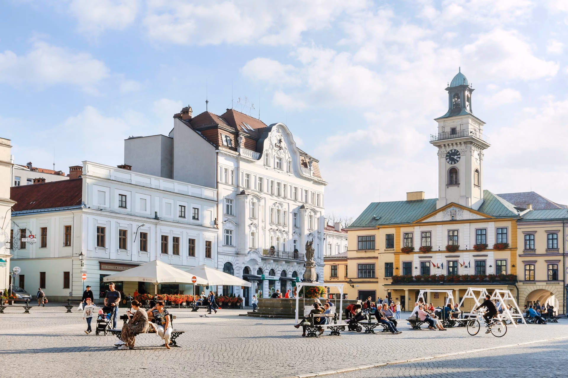 The Rynek in Cieszyn on a sunny day with arcades and café terraces