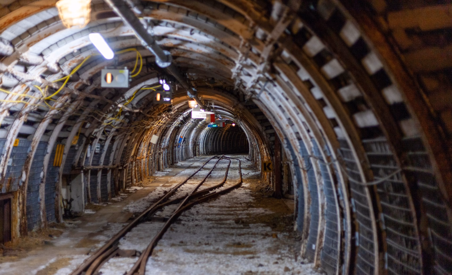 An underground passage with rails in the Queen Louise Adit in Zabrze